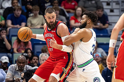 Nov 18, 2023; New Orleans, Louisiana, USA; New Orleans Pelicans center Jonas Valanciunas (17) fights for position against Minnesota Timberwolves center Karl-Anthony Towns (32) during the first half at the Smoothie King Center. Mandatory Credit: Stephen Lew-USA TODAY Sports