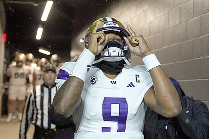 Nov 18, 2023; Corvallis, Oregon, USA; Washington Huskies  quarterback Michael Penix Jr. (9) walks out of the team tunnel before the game against the Oregon State Beavers at Reser Stadium. Mandatory Credit: Soobum Im-USA TODAY Sports