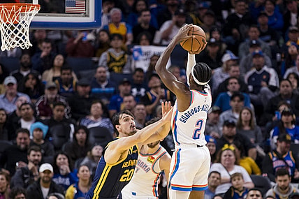 Nov 18, 2023; San Francisco, California, USA; Golden State Warriors center Dario Saric (20) defends Oklahoma City Thunder guard Shai Gilgeous-Alexander (2) during the second half at Chase Center. Mandatory Credit: John Hefti-USA TODAY Sports