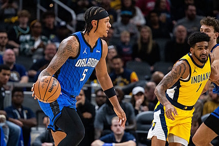 Nov 19, 2023; Indianapolis, Indiana, USA; Orlando Magic forward Paolo Banchero (5) dribbles the ball in the first quarter against the Indiana Pacers at Gainbridge Fieldhouse. Mandatory Credit: Trevor Ruszkowski-USA TODAY Sports