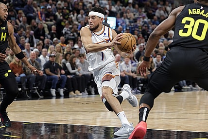 Nov 19, 2023; Salt Lake City, Utah, USA;  Phoenix Suns guard Devin Booker (1) drives to the basket during the second quarter against the Utah Jazz at Delta Center. Mandatory Credit: Chris Nicoll-USA TODAY Sports