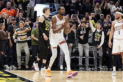 Nov 19, 2023; Salt Lake City, Utah, USA;  Phoenix Suns forward Kevin Durant (35) reacts after a foul is called on a shot by Utah Jazz forward Lauri Markkanen (23) during the second half at Delta Center. Mandatory Credit: Chris Nicoll-USA TODAY Sports