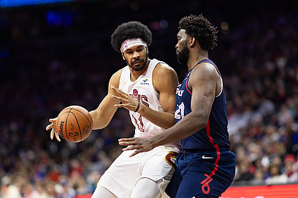 Nov 21, 2023; Philadelphia, Pennsylvania, USA; Cleveland Cavaliers center Jarrett Allen (31) controls the ball against Philadelphia 76ers center Joel Embiid (21) during the second quarter at Wells Fargo Center. Mandatory Credit: Bill Streicher-USA TODAY Sports