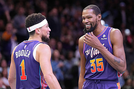 Nov 21, 2023; Phoenix, Arizona, USA; Phoenix Suns guard Devin Booker (1) and Phoenix Suns forward Kevin Durant (35) look on against the Portland Trail Blazers during the second half at Footprint Center. Mandatory Credit: Joe Camporeale-USA TODAY Sports