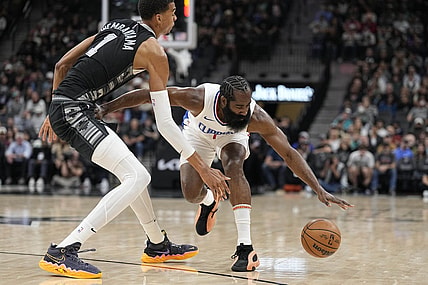 Nov 22, 2023; San Antonio, Texas, USA; Los Angeles Clippers guard James Harden (1) loses control of the ball while defended by San Antonio Spurs forward Victor Wembanyama (1) during the first half at Frost Bank Center. Mandatory Credit: Scott Wachter-USA TODAY Sports