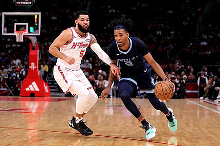 Nov 22, 2023; Houston, Texas, USA; Memphis Grizzlies forward Ziaire Williams (8) handles the ball against Houston Rockets guard Fred VanVleet (5) during the first quarter at Toyota Center. Mandatory Credit: Erik Williams-USA TODAY Sports