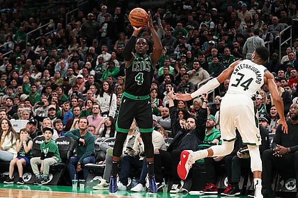 Nov 22, 2023; Boston, Massachusetts, USA; Boston Celtics guard Jrue Holiday (4) shoots during the first half against the Milwaukee Bucks at TD Garden. Mandatory Credit: Paul Rutherford-USA TODAY Sports