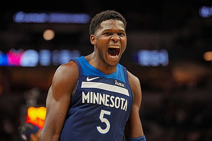 Nov 22, 2023; Minneapolis, Minnesota, USA; Minnesota Timberwolves guard Anthony Edwards (5) celebrates his basket against the Philadelphia 76ers in the third quarter at Target Center. Mandatory Credit: Brad Rempel-USA TODAY Sports