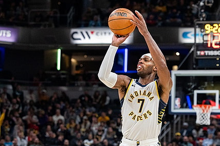Nov 22, 2023; Indianapolis, Indiana, USA; Indiana Pacers guard Buddy Hield (7) shoots the ball in the second half against the Toronto Raptors at Gainbridge Fieldhouse. Mandatory Credit: Trevor Ruszkowski-USA TODAY Sports