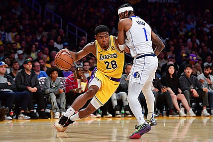 Nov 22, 2023; Los Angeles, California, USA; Los Angeles Lakers forward Rui Hachimura (28) moves to the basket against Dallas Mavericks guard Jaden Hardy (1) during the second half at Crypto.com Arena. Mandatory Credit: Gary A. Vasquez-USA TODAY Sports