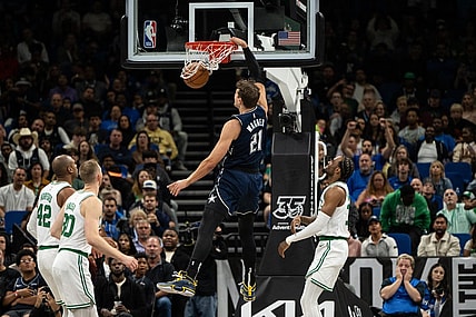 Nov 24, 2023; Orlando, Florida, USA; Orlando Magic forward Moritz Wagner (21) dunks the ball against the Boston Celtics in the second quarter at Amway Center. Mandatory Credit: Jeremy Reper-USA TODAY Sports