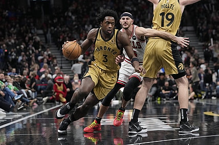Nov 24, 2023; Toronto, Ontario, CAN; Toronto Raptors forward O.G. Anunoby (3) drives to the basket as Chicago Bulls guard Alex Caruso (6) pursues during the first half at Scotiabank Arena. Mandatory Credit: John E. Sokolowski-USA TODAY Sports