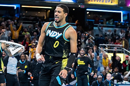 Nov 24, 2023; Indianapolis, Indiana, USA; Indiana Pacers guard Tyrese Haliburton (0) celebrates a made basket  in the second half against the Detroit Pistons at Gainbridge Fieldhouse. Mandatory Credit: Trevor Ruszkowski-USA TODAY Sports