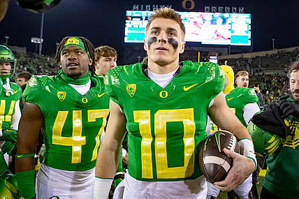Oregon quarterback Bo Nix walks off the field after the the No. 6 Oregon Ducks defeated the No. 16 Oregon State Beavers Friday, Nov. 24, 2023, at Autzen Stadium in Eugene, Ore.