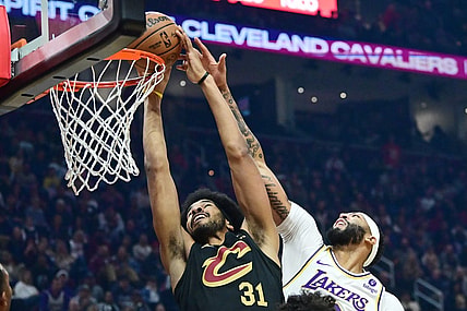 Nov 25, 2023; Cleveland, Ohio, USA; Cleveland Cavaliers center Jarrett Allen (31) drives to the basket against Los Angeles Lakers forward Anthony Davis (3) during the first half at Rocket Mortgage FieldHouse. Mandatory Credit: Ken Blaze-USA TODAY Sports