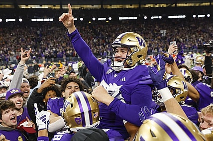Nov 25, 2023; Seattle, Washington, USA; Washington Huskies place kicker Grady Gross (95) celebrates after making a game-winning field goal against the Washington State Cougars during the fourth quarter at Alaska Airlines Field at Husky Stadium. Mandatory Credit: Joe Nicholson-USA TODAY Sports