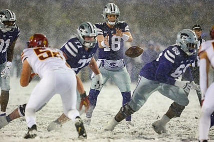 Nov 25, 2023; Manhattan, Kansas, USA; Kansas State Wildcats quarterback Will Howard (18) takes the snap during the second quarter against the Iowa State Cyclones at Bill Snyder Family Football Stadium. Mandatory Credit: Scott Sewell-USA TODAY Sports