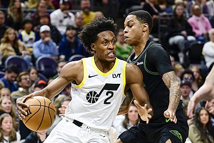 Nov 25, 2023; Salt Lake City, Utah, USA; Utah Jazz guard Collin Sexton (2) dribbles the ball against New Orleans Pelicans guard Jordan Hawkins (24) during the first half at Delta Center. Mandatory Credit: Christopher Creveling-USA TODAY Sports