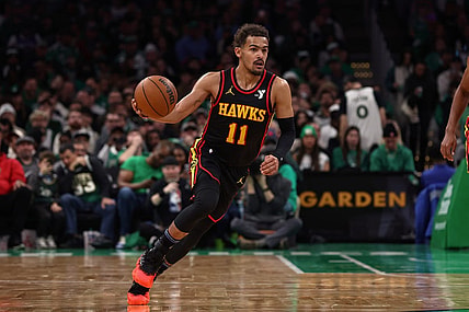 Nov 26, 2023; Boston, Massachusetts, USA; Atlanta Hawks guard Trae Young (11) brings the ball up the court against the Boston Celtics during the second quarter at TD Garden. Mandatory Credit: Winslow Townson-USA TODAY Sports