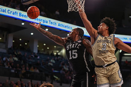 Nov 28, 2023; Atlanta, Georgia, USA; Mississippi State Bulldogs forward Jimmy Bell Jr. (15) grabs a rebound past Georgia Tech Yellow Jackets guard Dallan Coleman (3) in the first half at McCamish Pavilion. Mandatory Credit: Brett Davis-USA TODAY Sports
