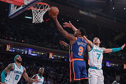 Nov 28, 2023; New York, New York, USA; New York Knicks guard RJ Barrett (9) drives to the basket as Charlotte Hornets guard Bryce McGowens (7) and forward Miles Bridges (0) defend during the first half at Madison Square Garden. Mandatory Credit: Vincent Carchietta-USA TODAY Sports
