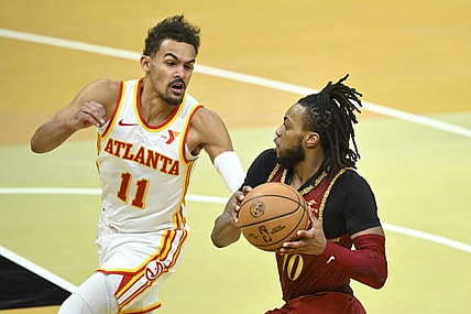 Nov 28, 2023; Cleveland, Ohio, USA; Atlanta Hawks guard Trae Young (11) defends Cleveland Cavaliers guard Darius Garland (10) in the fourth quarter at Rocket Mortgage FieldHouse. Mandatory Credit: David Richard-USA TODAY Sports
