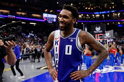 Nov 28, 2023; Sacramento, California, USA; Sacramento Kings guard Malik Monk (0) is interviewed after a game against the Golden State Warriors at Golden 1 Center. Mandatory Credit: Sergio Estrada-USA TODAY Sports