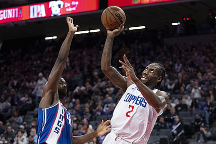 November 29, 2023; Sacramento, California, USA; LA Clippers forward Kawhi Leonard (2) shoots the basketball against Sacramento Kings forward Harrison Barnes (40) during the third quarter at Golden 1 Center. Mandatory Credit: Kyle Terada-USA TODAY Sports