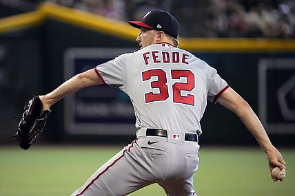 Jul 24, 2022; Phoenix, Arizona, USA; Washington Nationals starting pitcher Erick Fedde (32) pitches against the Arizona Diamondbacks during the first inning at Chase Field. Mandatory Credit: Joe Camporeale-USA TODAY Sports