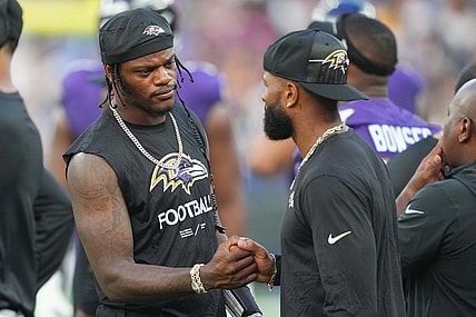 Aug 12, 2023; Baltimore, Maryland, USA; Baltimore Ravens quarterback Lamar Jackson (left) greets wide receiver  Odell Beckham Jr (right) on the sideline during the first quarter against the Philadelphia Eagles at M&T Bank Stadium. Mandatory Credit: Mitch Stringer-USA TODAY Sports