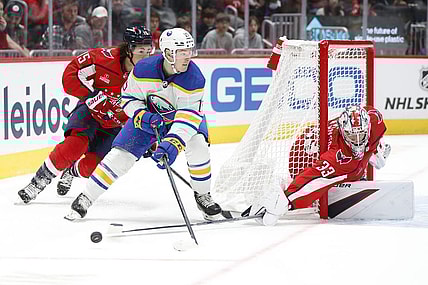 Sep 24, 2023; Washington, District of Columbia, USA; Washington Capitals goalie Clay Stevenson (33) makes a save against Buffalo Sabres forward Brandon Biro (15) during overtime at Capital One Arena. Mandatory Credit: Amber Searls-USA TODAY Sports
