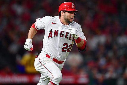 Sep 26, 2023; Anaheim, California, USA; Los Angeles Angels second baseman David Fletcher (22) runs after hitting a single against the Texas Rangers during the fifth inning at Angel Stadium. Mandatory Credit: Gary A. Vasquez-USA TODAY Sports