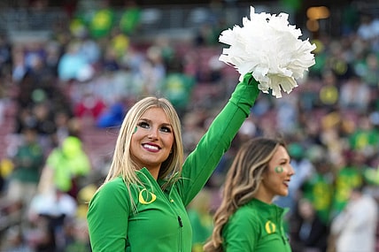 Sep 30, 2023; Stanford, California, USA; An Oregon Ducks cheerleader performs during the third quarter against the Stanford Cardinal at Stanford Stadium. Mandatory Credit: Darren Yamashita-USA TODAY Sports
