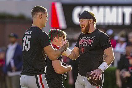 Georgia Bulldogs quarterbacks Carson Beck (15) and quarterback Brock Vandagriff (12) react on the field prior to the game against the Kentucky Wildcats at Sanford Stadium. Mandatory Credit: Dale Zanine-USA TODAY Sports