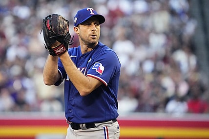 Texas Rangers starting pitcher Max Scherzer (31) prepares to throw a pitch against the Arizona Diamondbacks during the first inning in game three of the 2023 World Series at Chase Field on Oct. 30, 2023, in Phoenix, Arizona.