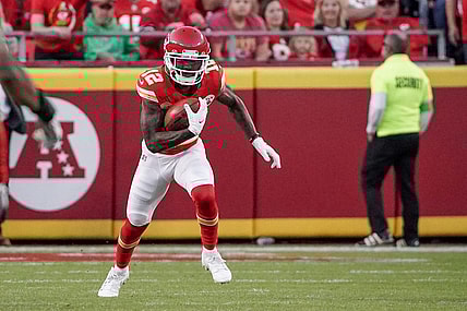 Oct 12, 2023; Kansas City, Missouri, USA; Kansas City Chiefs wide receiver Mecole Hardman Jr. (12) returns a kick against the Los Angeles Chargers during the game at GEHA Field at Arrowhead Stadium. Mandatory Credit: Denny Medley-USA TODAY Sports