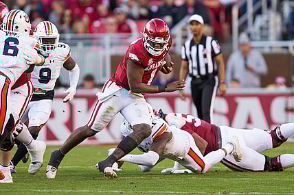 Nov 11, 2023; Fayetteville, Arkansas, USA;  Arkansas Razorbacks quarterback KJ Jefferson (1) gets past Auburn Tigers linebacker Elijah McAllister (11) during the second quarter at Donald W. Reynolds Razorback Stadium. Mandatory Credit: Brett Rojo-USA TODAY Sports