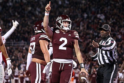 Nov 23, 2023; Starkville, Mississippi, USA; Mississippi State Bulldogs quarterback Will Rogers (2) reacts during the second half against the Mississippi Rebels at Davis Wade Stadium at Scott Field. Mandatory Credit: Petre Thomas-USA TODAY Sports