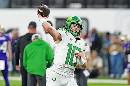 Dec 1, 2023; Las Vegas, NV, USA; Oregon Ducks quarterback Bo Nix (10) warms up before a game against the Washington Huskies at Allegiant Stadium. Mandatory Credit: Stephen R. Sylvanie-USA TODAY Sports