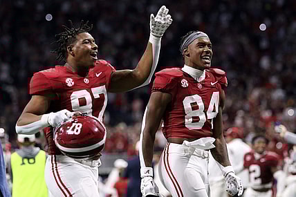 Dec 2, 2023; Atlanta, GA, USA;  Alabama Crimson Tide tight end Amari Niblack (84) and tight end Danny Lewis Jr. (87) celebrate after defeating the Georgia Bulldogs in the SEC championship game at Mercedes-Benz Stadium. Mandatory Credit: Jordan Godfree-USA TODAY Sports