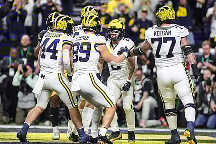 Michigan running back Blake Corum celebrates a touchdown against Iowa during the first half of the Big Ten championship game at Luca Oil Stadium in Indianapolis, Ind. on Saturday, Dec. 2, 2023.