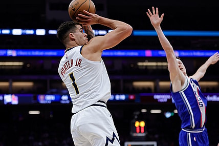 Dec 2, 2023; Sacramento, California, USA; Denver Nuggets forward Michael Porter Jr. (1) shoots the ball against Sacramento Kings guard Kevin Huerter (9) during the second quarter at Golden 1 Center. Mandatory Credit: Sergio Estrada-USA TODAY Sports