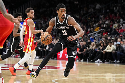 Dec 6, 2023; Atlanta, Georgia, USA; Brooklyn Nets center Nic Claxton (33) controls the ball against the Atlanta Hawks during the second half at State Farm Arena. Mandatory Credit: Dale Zanine-USA TODAY Sports