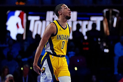Dec 7, 2023; Las Vegas, Nevada, USA; Indiana Pacers guard Tyrese Haliburton (0) celebrates after beating the Milwaukee Bucks in the NBA In Season Tournament Semifinal at T-Mobile Arena. Mandatory Credit: Kyle Terada-USA TODAY Sports