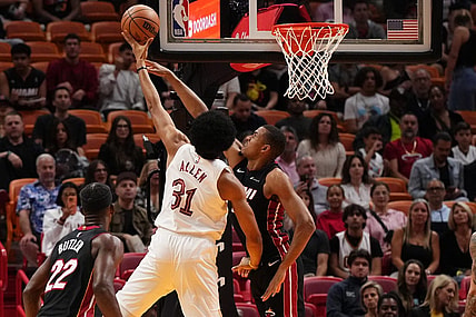 Dec 8, 2023; Miami, Florida, USA; Cleveland Cavaliers center Jarrett Allen (31) puts up a shot over Miami Heat center Orlando Robinson (25) during the first half at Kaseya Center. Mandatory Credit: Jasen Vinlove-USA TODAY Sports