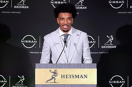 Dec 9, 2023; New York, New York, USA; LSU Tigers quarterback Jayden Daniels speaks to the media during a press conference in the Astor ballroom at the New York Marriott Marquis after winning the Heisman trophy. Mandatory Credit: Brad Penner-USA TODAY Sports