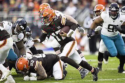 Dec 10, 2023; Cleveland, Ohio, USA; Cleveland Browns quarterback Dorian Thompson-Robinson (17) runs the ball against the Jacksonville Jaguars during the fourth quarter at Cleveland Browns Stadium. Mandatory Credit: Scott Galvin-USA TODAY Sports