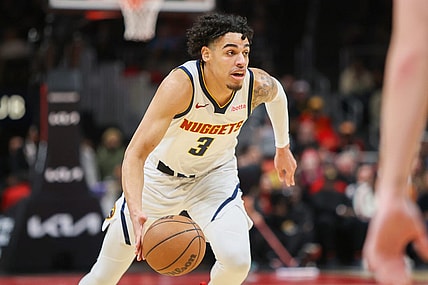Dec 11, 2023; Atlanta, Georgia, USA; Denver Nuggets guard Julian Strawther (3) dribbles against the Atlanta Hawks in the second quarter at State Farm Arena. Mandatory Credit: Brett Davis-USA TODAY Sports