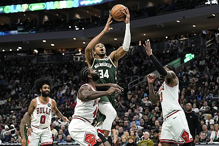 Dec 11, 2023; Milwaukee, Wisconsin, USA;  Milwaukee Bucks forward Giannis Antetokounmpo (34) shoots over Chicago Bulls forward Patrick Williams (44) during the fourth quarter at Fiserv Forum. Mandatory Credit: Jeff Hanisch-USA TODAY Sports