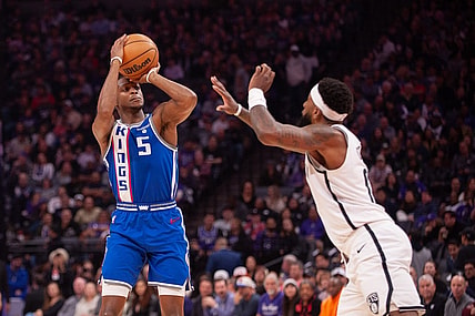 Dec 11, 2023; Sacramento, California, USA; Sacramento Kings guard De'Aaron Fox (5) takes a jump shot during the first quarter at Golden 1 Center. Mandatory Credit: Ed Szczepanski-USA TODAY Sports